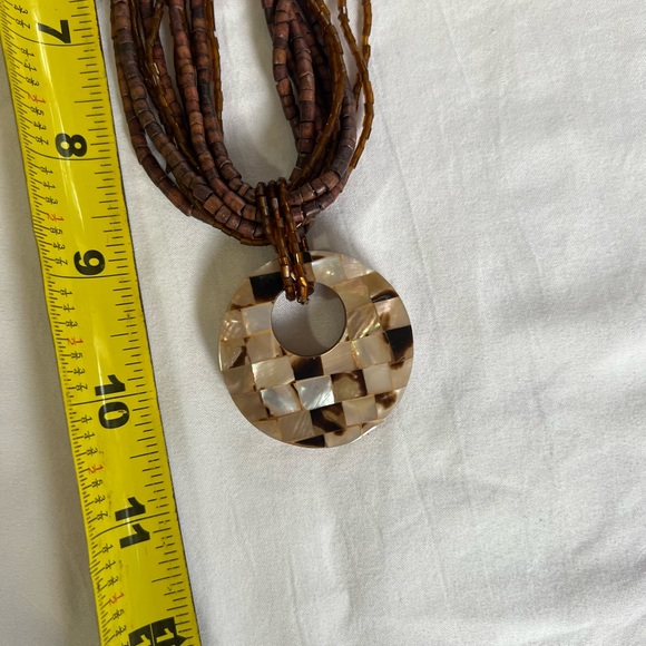 Brown beaded necklace with medallion - Picture 7 of 7